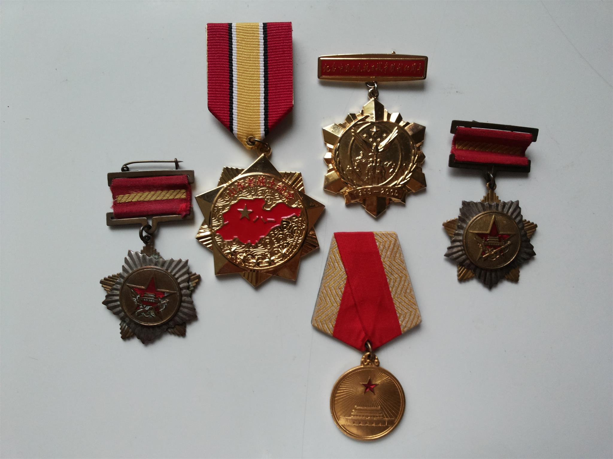 5-1,臧桂田在抗日战争 解放战争中获得的奖章.jpg